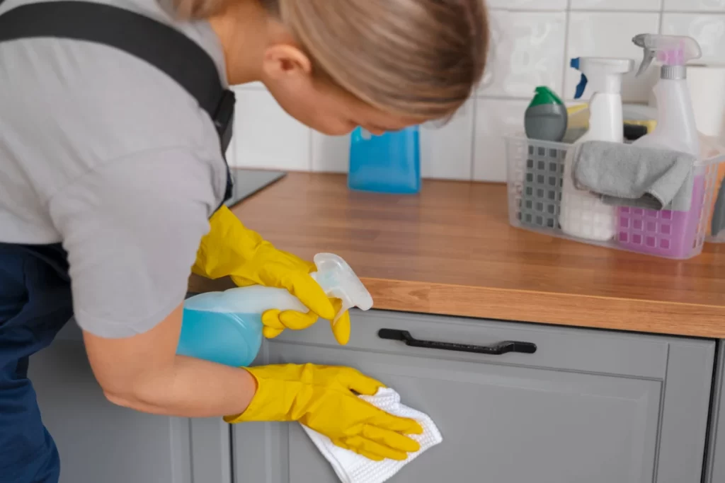 Side view woman deep cleaning home